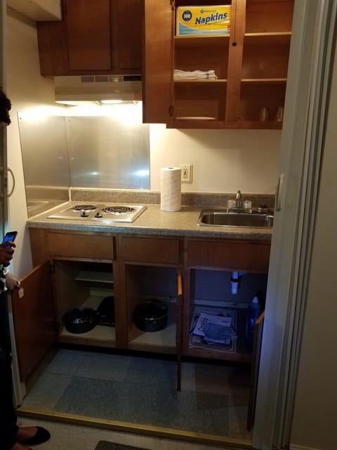 Fridge, microwave, stovetop, coffee/tea maker