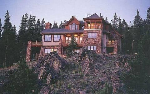 Towers over 30 acre meadow below