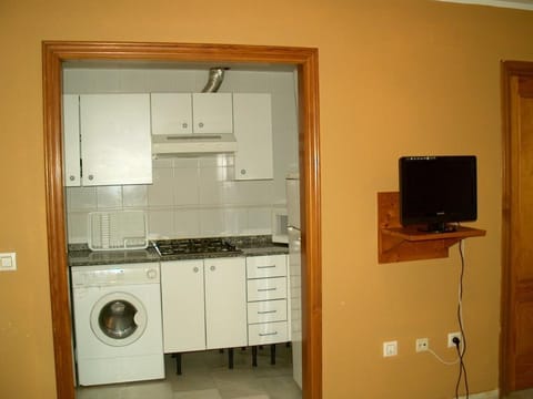 Fridge, microwave, coffee/tea maker, toaster