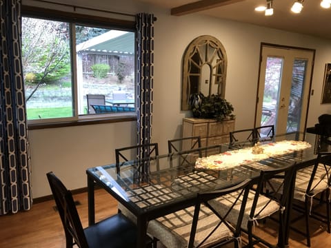 Dining room table seats ten (10) persons.