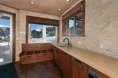 Basement entryway to enter from the ski slopes. Closets for ski/gear storage, mini fridge and dishwasher.