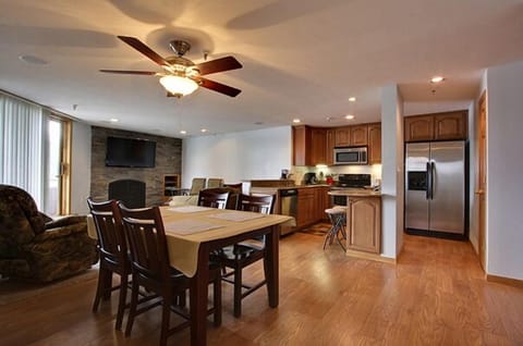Dining area, full kitchen and living room.