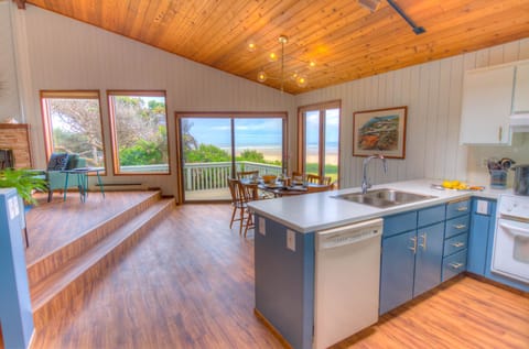 Bright and cheery kitchen has all the amenities.