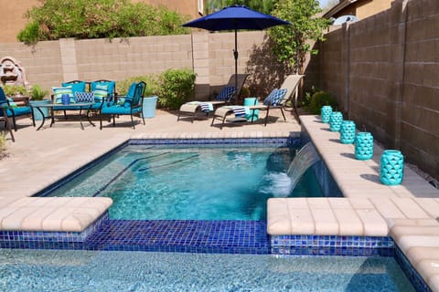 Sanctuary backyard with private pool, spa and variety of seating areas.