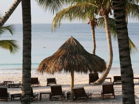 On the beach, sun loungers