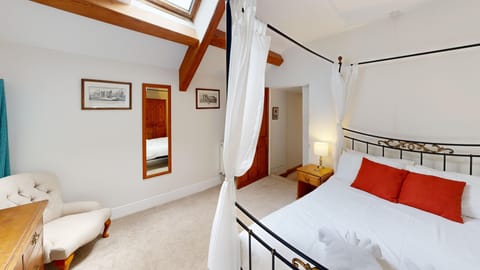 Four-Poster Master Bedroom with Skylight