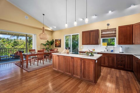 Beautiful woods adorn this well-equipped kitchen