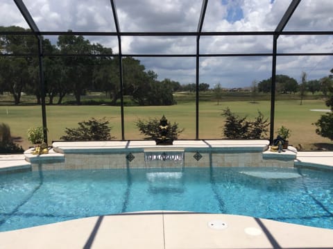 View of your heated private pool and golf course