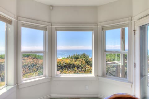 Bay window in the living room offers ocean views.