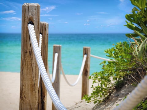 On the beach, sun loungers, beach towels