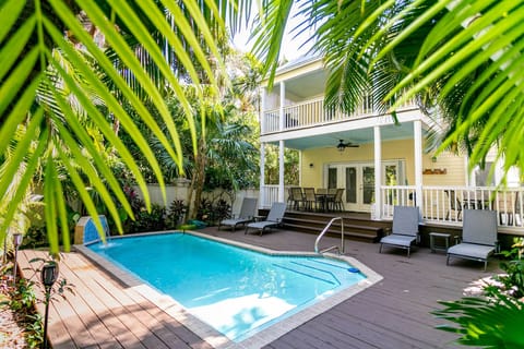 Relax in our private backyard with your own pool!