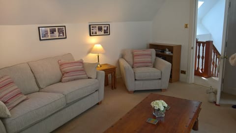 Spacious lounge with new sofas