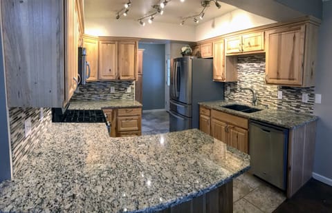 Remodeled kitchen with granite counter tops 