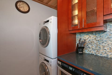 Frontloading washer and dryer with detergent provided. 