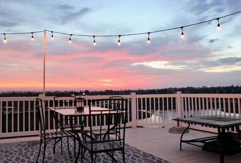 Enjoy the stunning views of the Pacific Ocean from the back deck and fire pit.