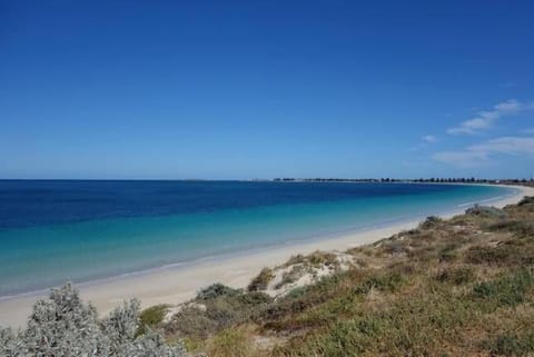 On the beach, sun loungers, beach towels