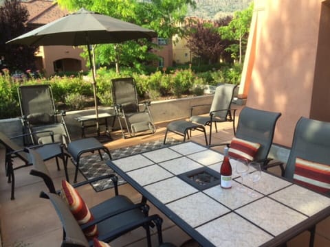 Sunny 400 sq.ft patio with patio furniture, umbrella, BBQ and firepit