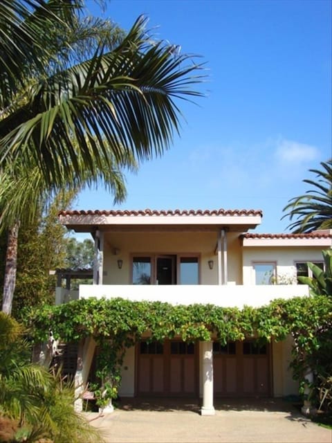 Casita surrounded by Palms and Plumeria.