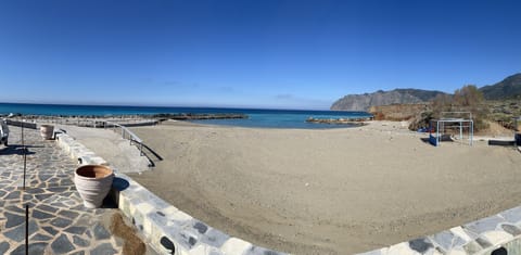 On the beach, sun loungers