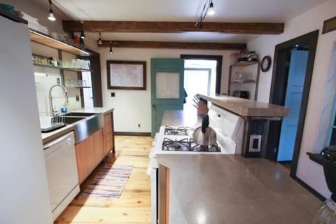 Bathroom and stairs are to the L, back door is straight ahead, dining room R