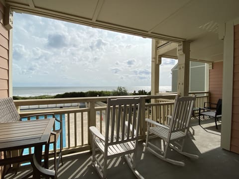 Double porch. Rocking chairs and counter  height set for dolphin watching.