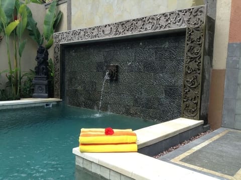 Relax poolside in the tranquility of Villa Laba Puseh.