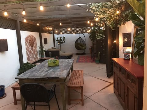Private outdoor patio with space heater during cooler months
