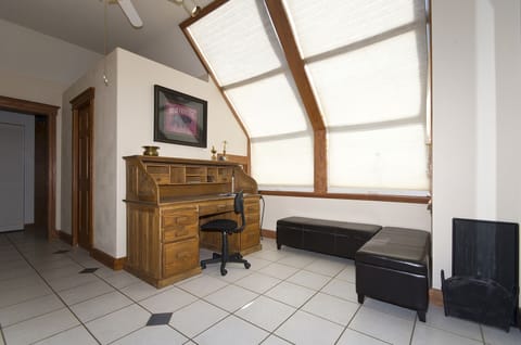 rear entry from garage  With desk area, 1/2 bath and washer dryer (the ski room)