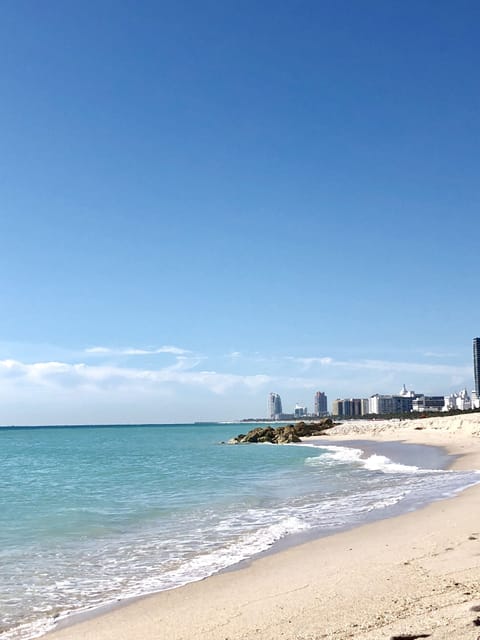 On the beach, sun loungers, beach towels