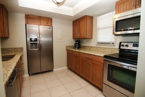 Kitchen just remodeled features Granite counter top, stainless steel appliances.
