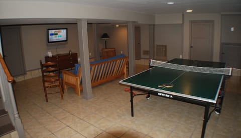 The basement features a lake view, ping-pong table, Wii system and a 42" LCD TV