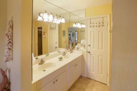 Master bath features a double sink with plenty of cabinet, and counter space