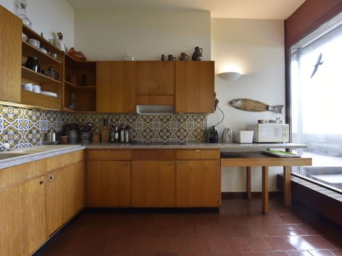 Countertop, Room, Property, Cabinetry, Furniture, Kitchen, Floor, Building, Interior Design, Kitchen Stove