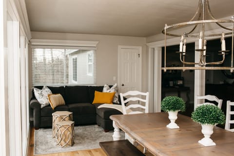 Dining room with extra seating for a relaxing book reading spot with a view