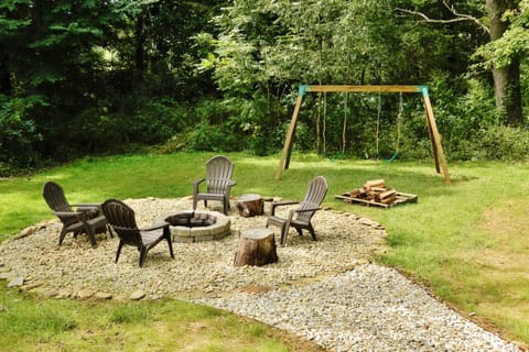 Children can enjoy the Swing-Set while you enjoy relaxing at the fire-pit!