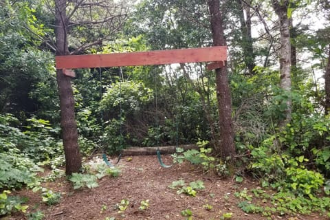 "Our kids (2 and 4 years old) loved the backyard with the pond, swing, climbing trees and little path." - Tanya