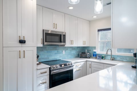 The beautiful renovated kitchen will delight even the fussiest family cook.