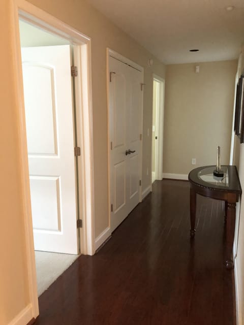 Hallway to 3 additional bedrooms.