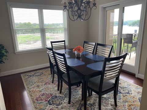 Enjoy views of the lake while you eat! Connected to kitchen and family room.