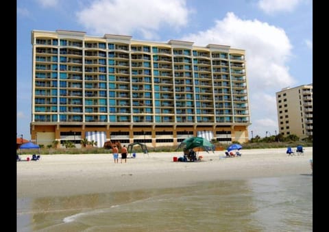 On the beach, sun loungers, beach towels