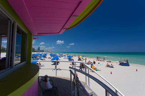 On the beach, sun loungers, beach towels