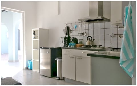 Fridge, stovetop, coffee/tea maker, toaster