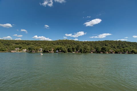 Lake Austin, directly behind the house. 