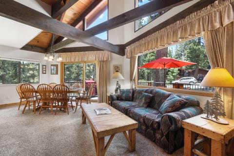 Bask in the natural light of this inviting living area with views of the pines.