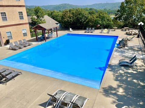Large pool in lower level parking area, overlooking the Ozarks!