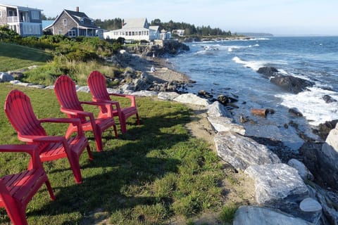 Taken from the point which faces east. There is a small rocky beach to the left.