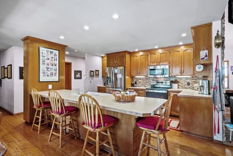 Seating at the counter to watch the cook.