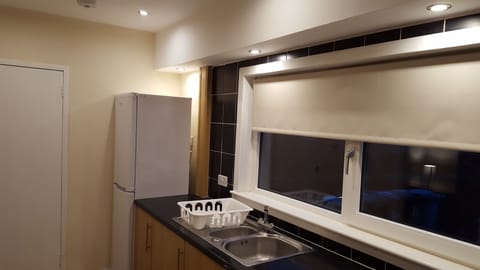 Kitchen view 1 with large fridge freezer