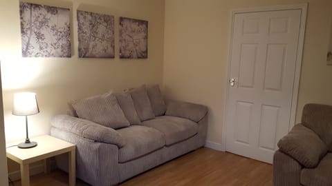 View of Living room while standing next to the dining tabel