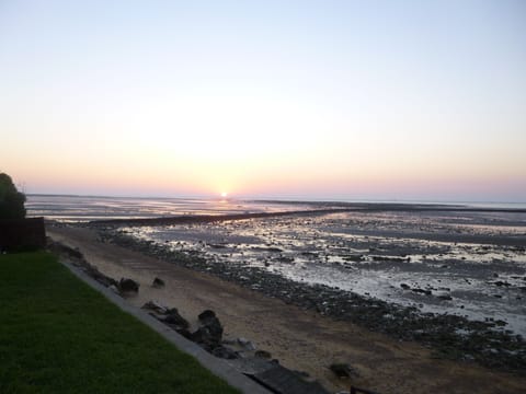 On the beach, sun loungers